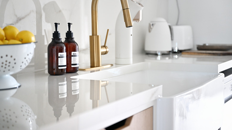 Close up of polished marble countertop and sink