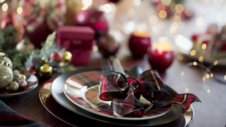 Christmas table with plaid ribbon napkin ring