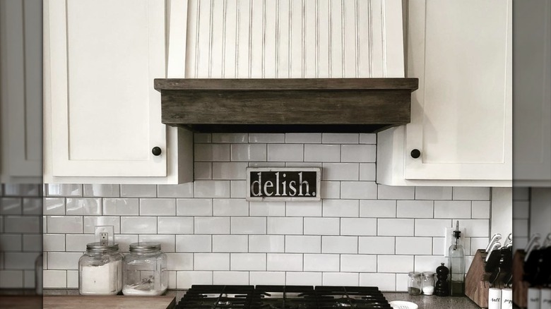 White beadboard range hood and white kitchen cabinets