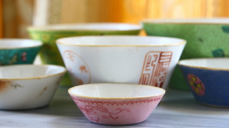 Various sized Chinese bowls on a table