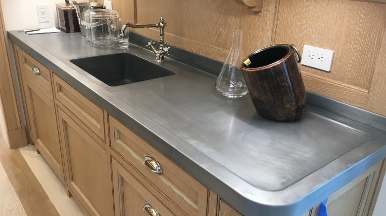 kitchen sink with zinc countertops