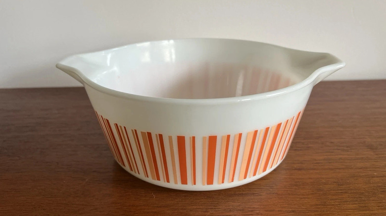 Pyrex casserole dish in a rare Barcode colorway of orange and white