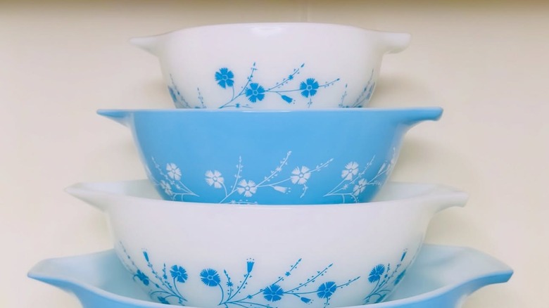 Shot of four blue dianthus Pyrex bowls stacked in size order
