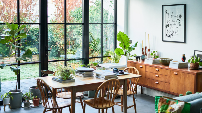 Dining room with wood buffet, and table and chair set