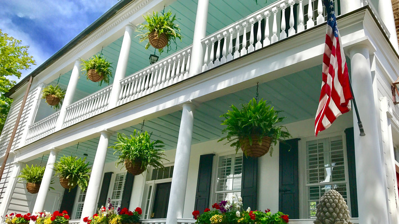 Haint blue ceiling on two levels of porches