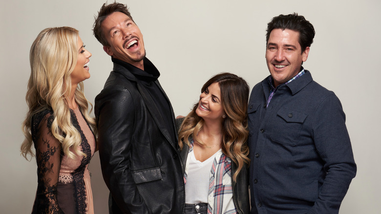 Christina Haack, David Bromstad, Alison Victoria, and Jonathan Knight stand together laughing