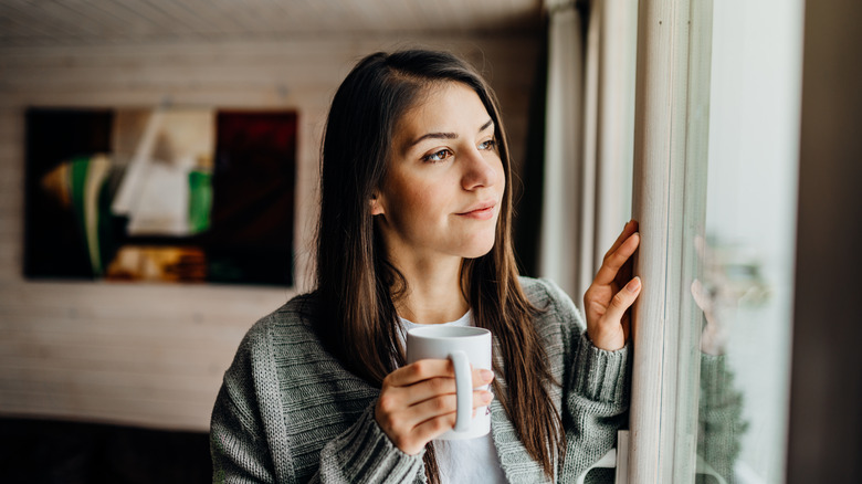 girl looking out window