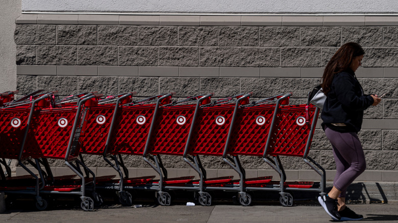 woman and Target shopping carts
