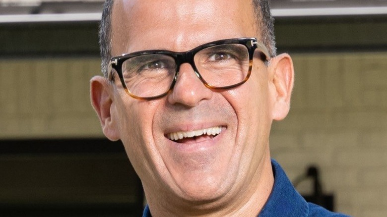 Marcus Lemonis smiling outside