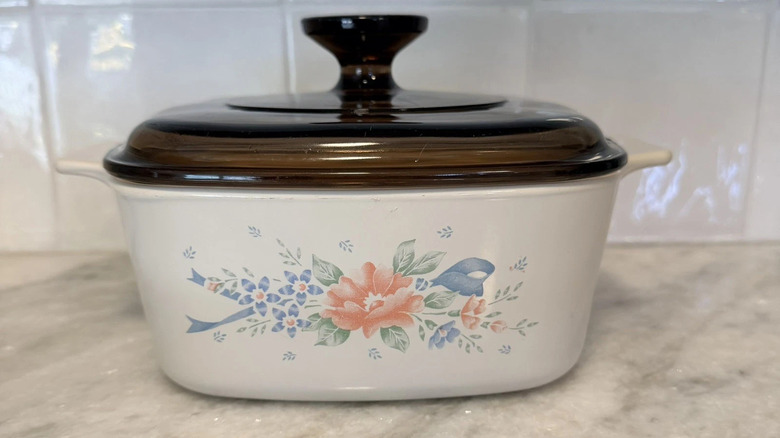 The CorningWare Symphony casserole dish with brown glass lid