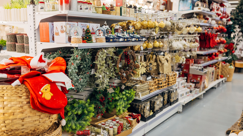 Store shelves full of Christmas decorations.