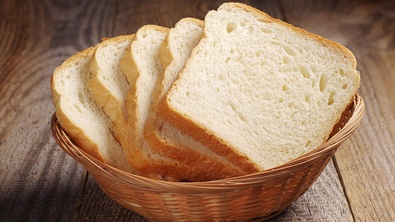 Wicker basket of sliced white bread
