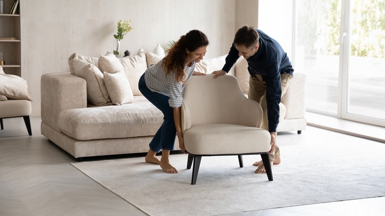 couple moving furniture