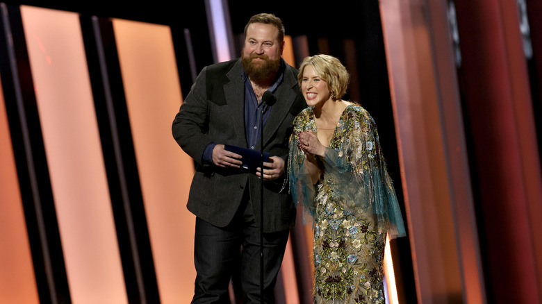 Erin and Ben Napier on stage at an awards ceremony