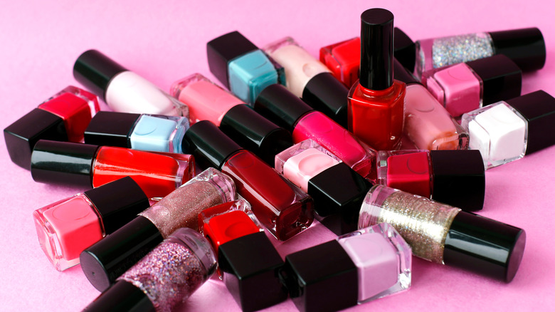 pile of nail polish bottles