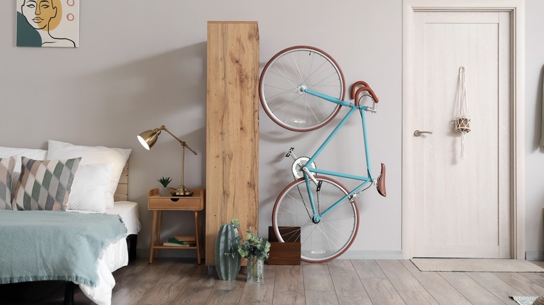 bike hanging on bedroom wall