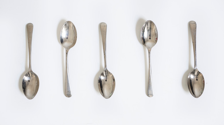 Spoons on white background