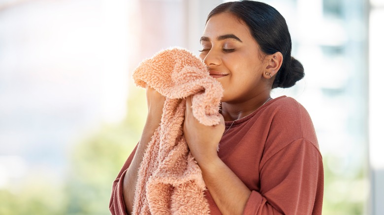 Women holding cozy blanket