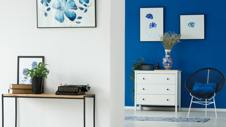 A room with a bold blue accent wall