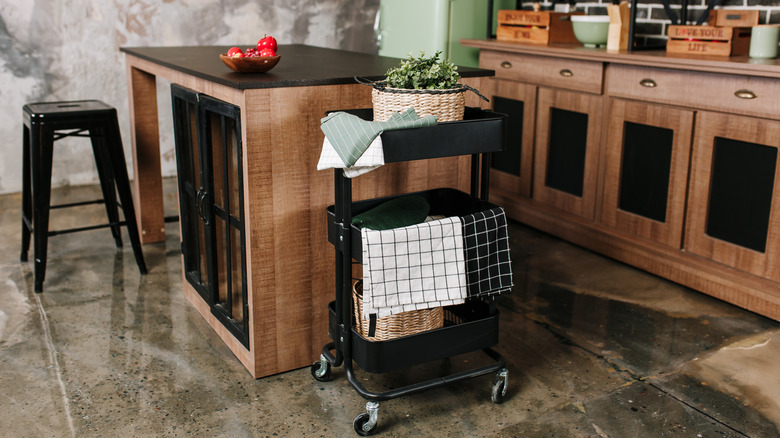 Rolling storage cart in kitchen 