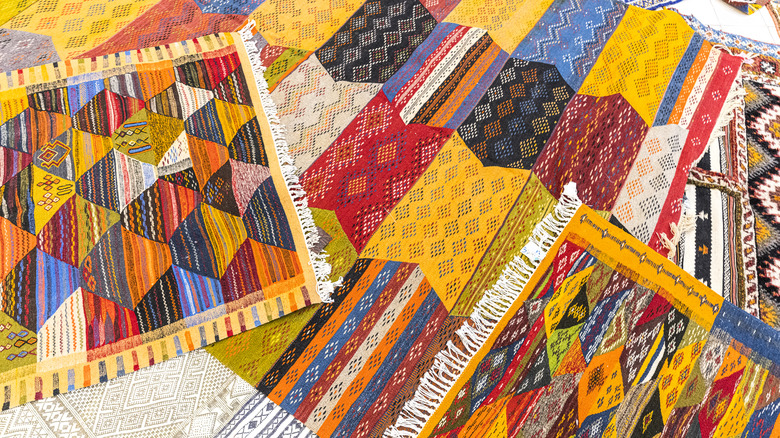 Pile of colorful rugs
