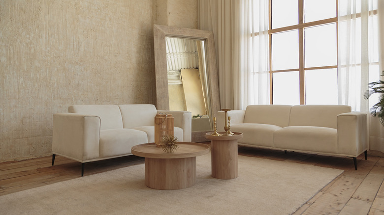 Modern rustic living rooms with light, neutral colors and organic materials used in the design