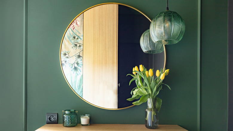 Gold circular wall mirror