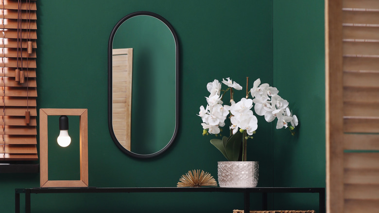 Forest green paint in powder room