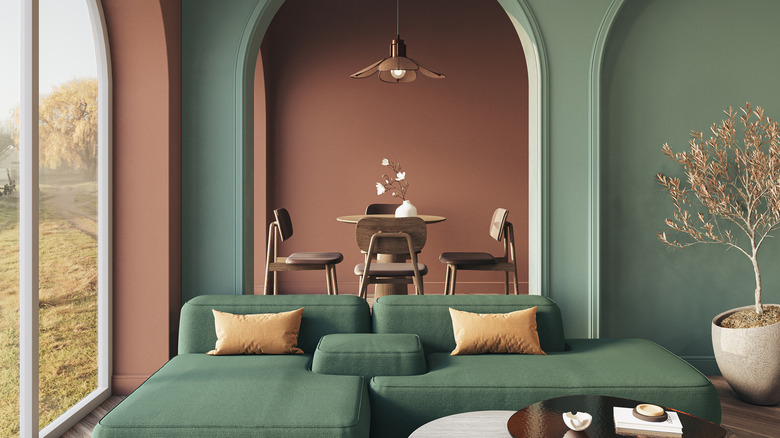 Forest green living room with brown accents