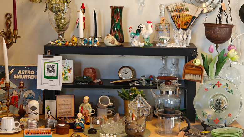 A display of vintage trinkets in a thrift store