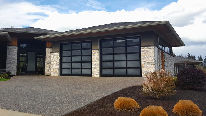A home with a full-view aluminum garage door