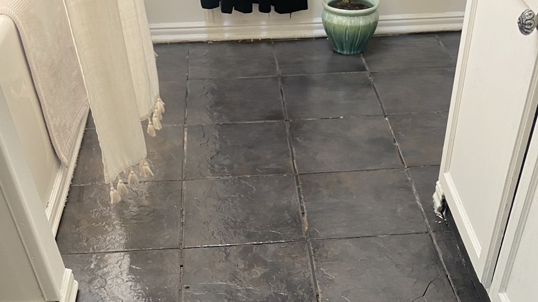 freshly mopped slate tile floor