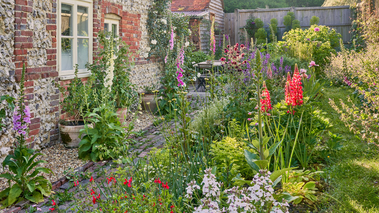cottage garden beside an old brick house