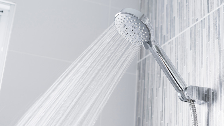 close up of running shower head