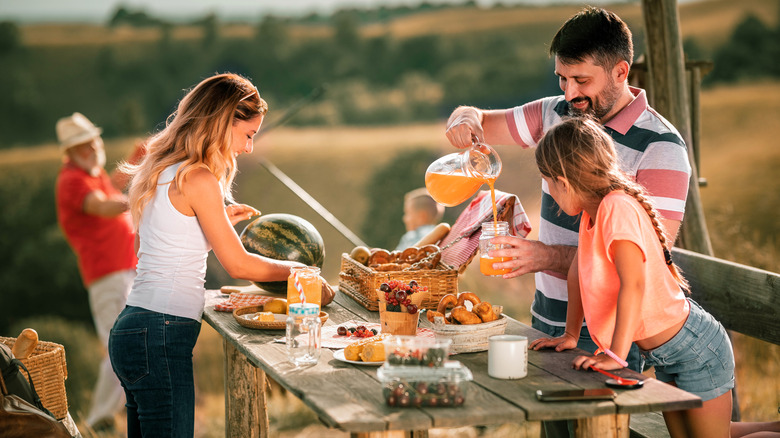 Family around picnic table