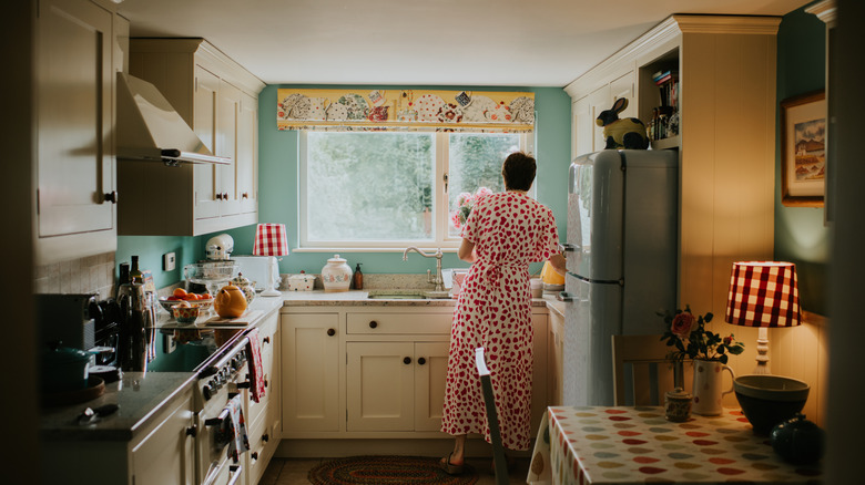 Woman in vintage style kitchen