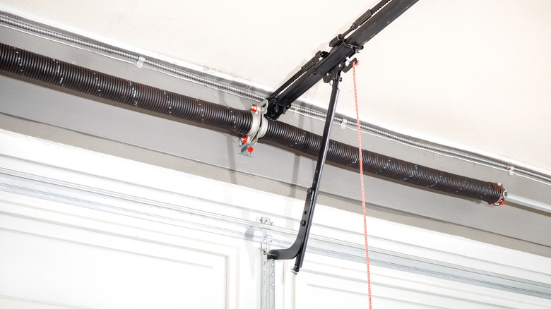 The emergency release cord for a garage door.