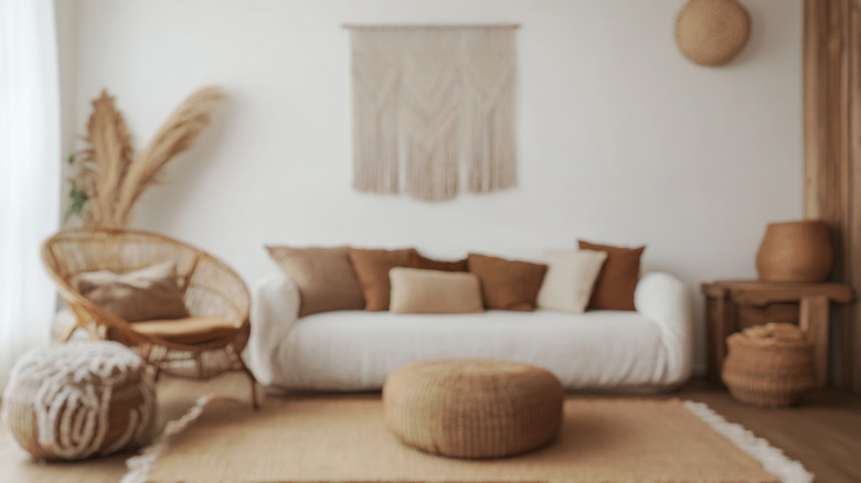 A bohemian living area with a jute rug
