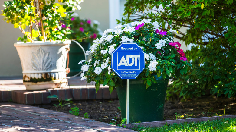 A security sign at the entrance of a home
