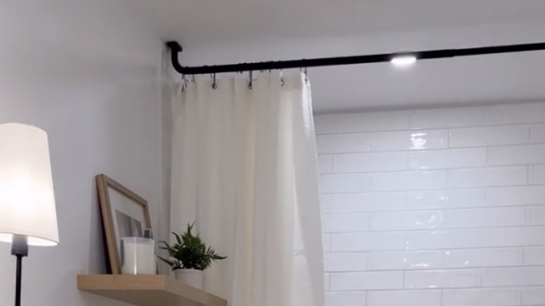 shower curtain rod close to ceiling