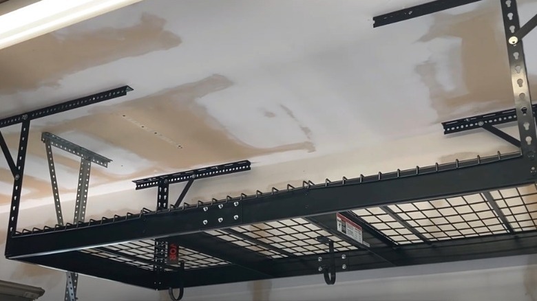 overhead storage rack attached to garage ceiling