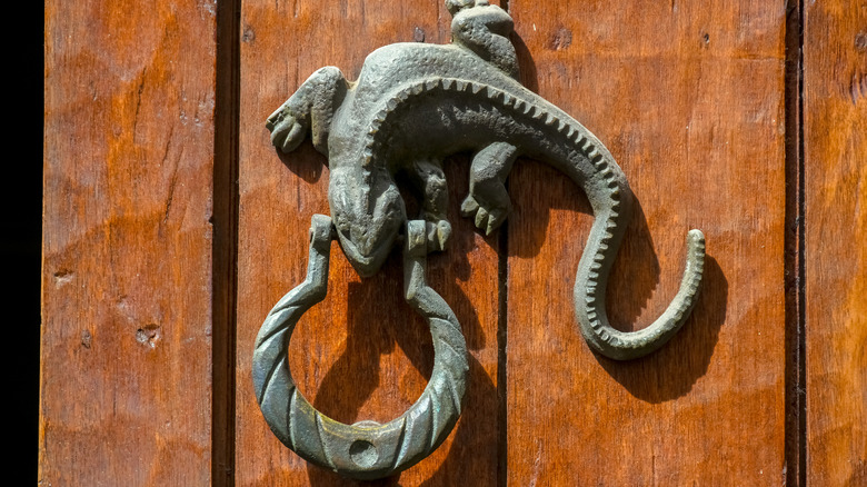 Lizard shaped door knocker adds unique touch