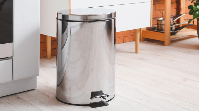 Aluminum trash can in kitchen