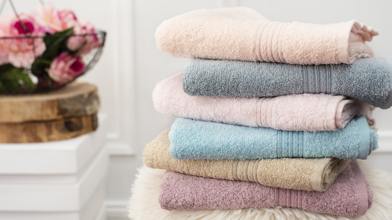 stack of clean towels in bathroom
