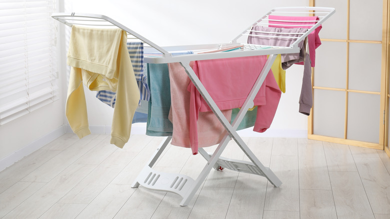 Clothes rack with drying laundry on it