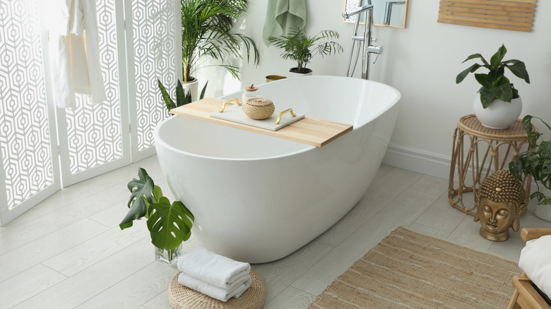 Bathroom with textured mat and luxurious towels