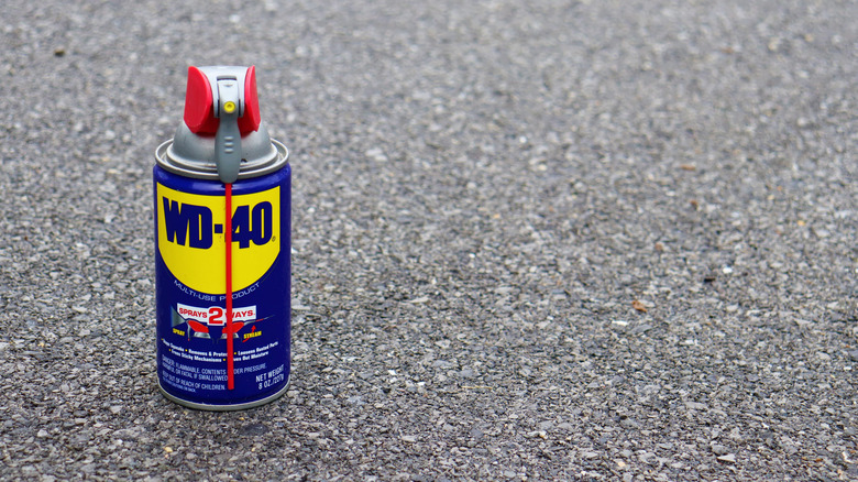 Can of WD-40 on concrete