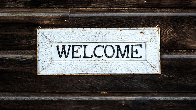 Rustic welcome sign on a home