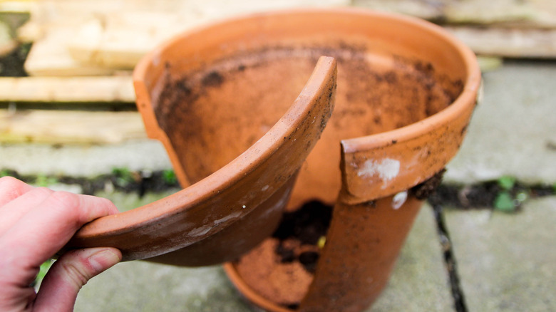 A broken ceramic flower pot