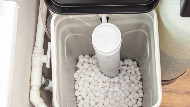 Water softener filled with white pellets